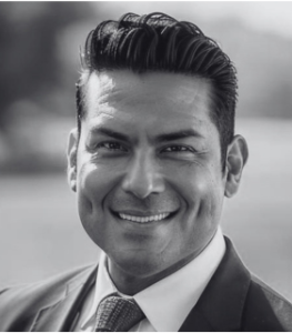 Black-and-white headshot of Board member Col. Francisco Leija
